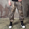 Fábrica de pantalones de pie de paquete de camuflaje suelto para hombres de moda